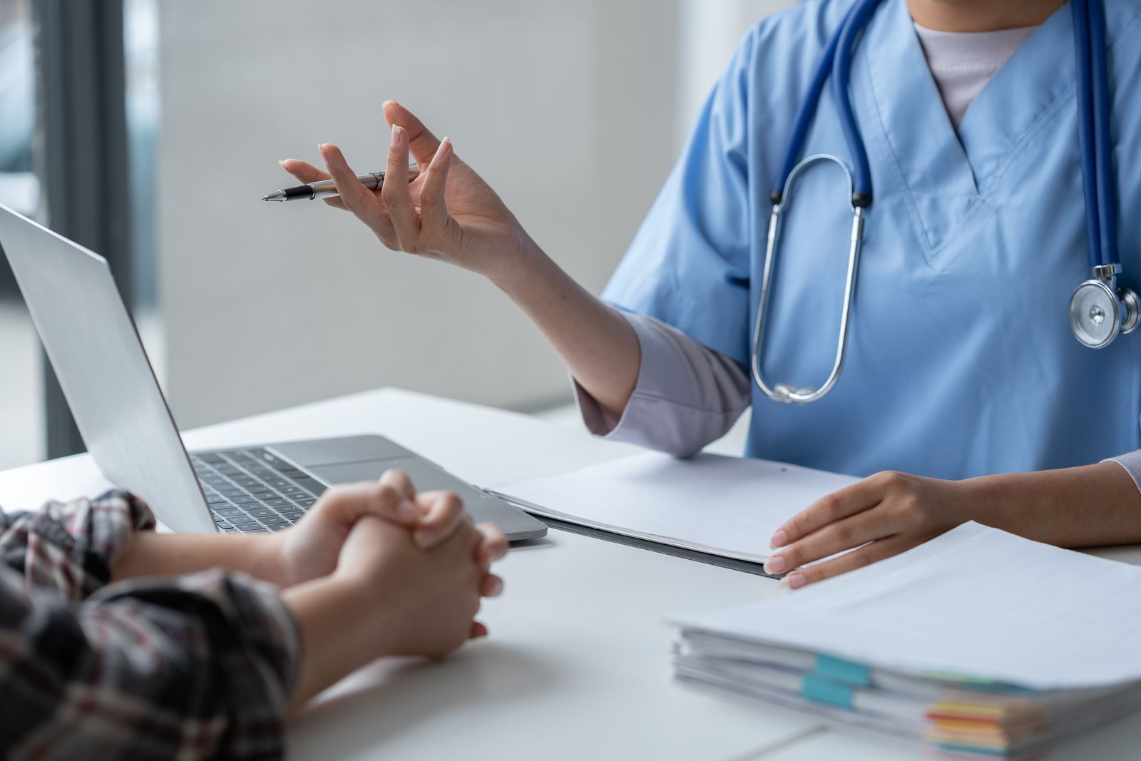 Licensed provider consulting with a patient